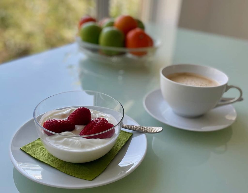 A delicious breakfast on a glass table